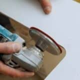 Grinding wood on a countertop